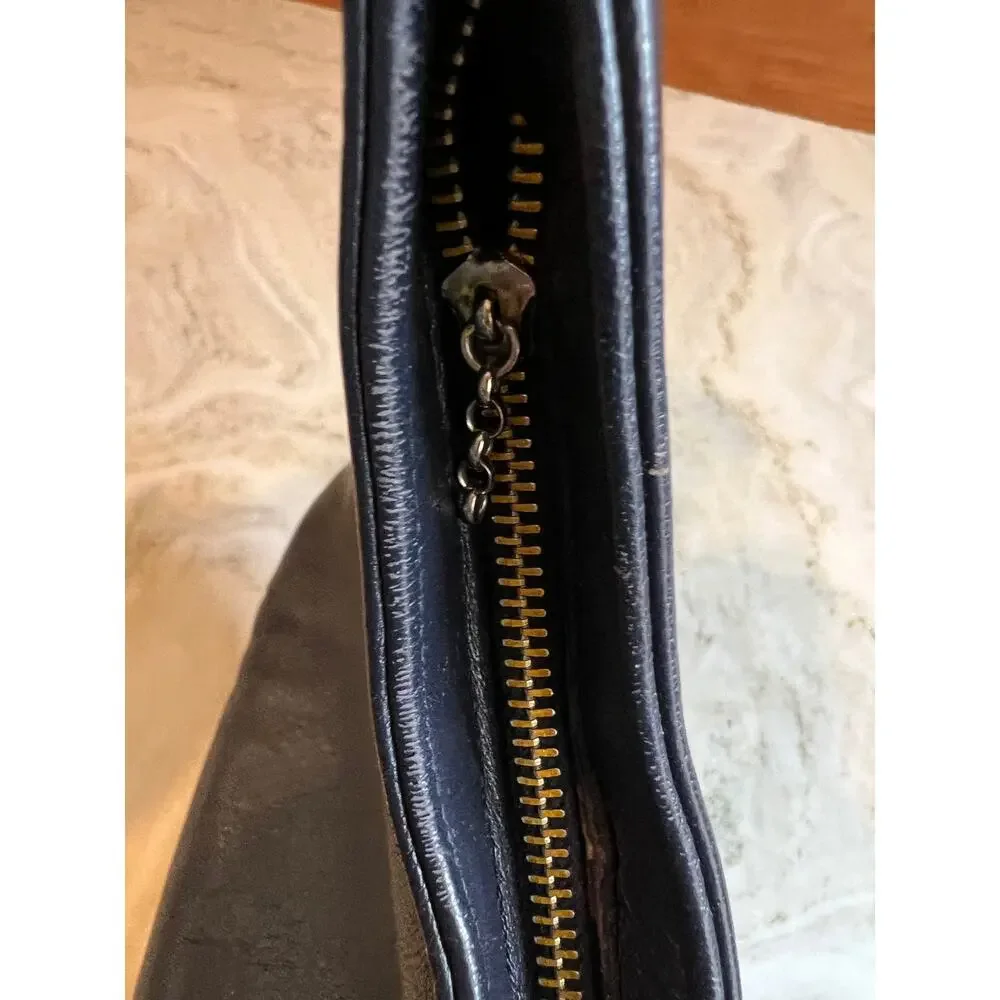 Vintage 70s navy blue leather curved bottom bag